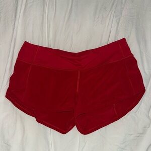 Red lululemon speed up low rise 2.5 shorts